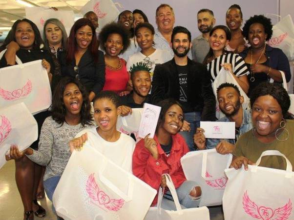 Delighted designers with Fabric and Bridal owner, Moe Saloojee (Centre) together with Phumelele Mntungwa (BSTMU) and Greg Wallis (Class mentor). Durban Fashion Fair 2019